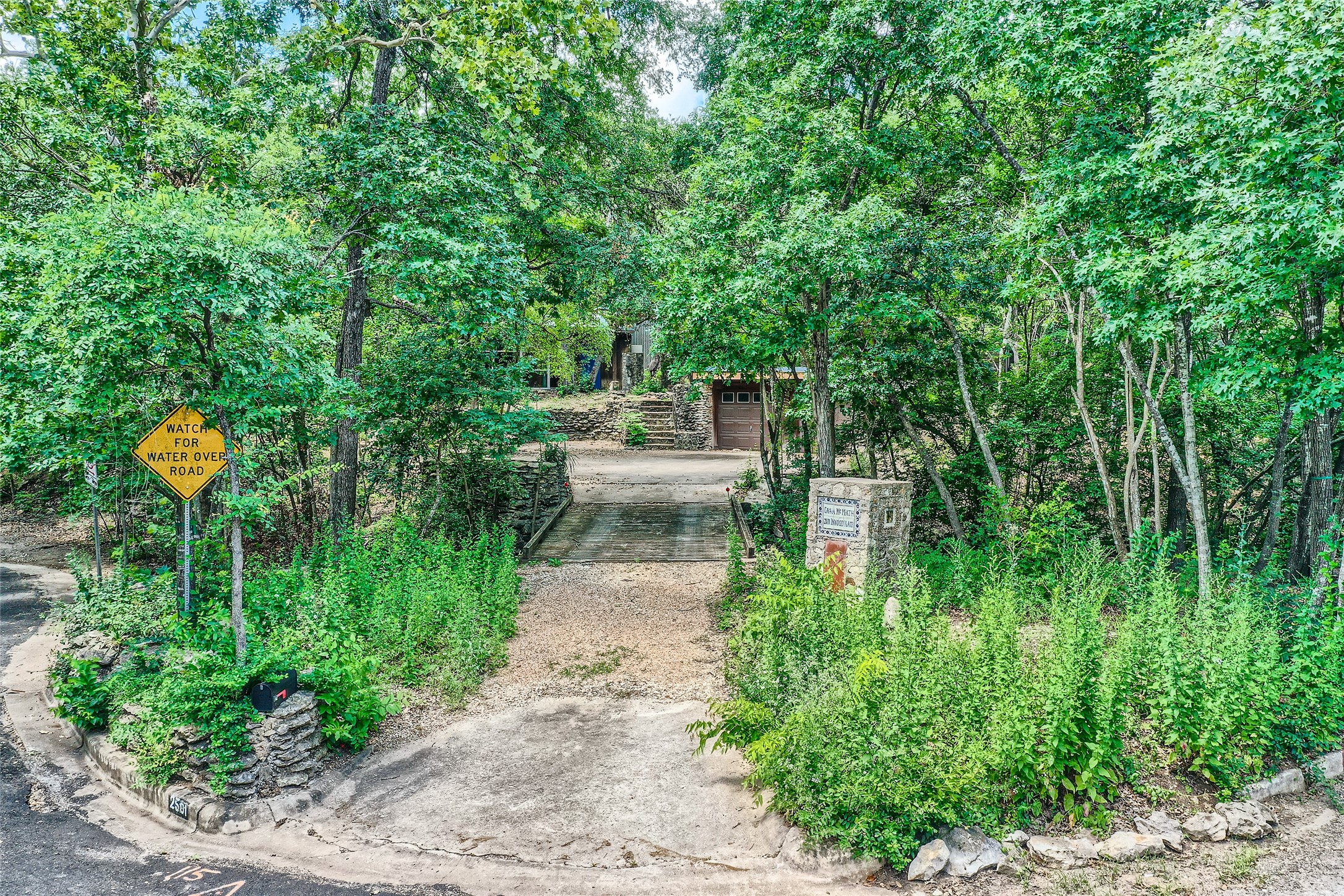 2501 Inwood Place Austin, TX 78703 - Photo 9 of 18 a view of a garden with lawn chairs and plants