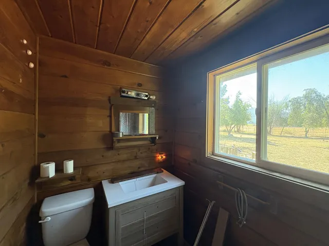 a kitchen with lots of counter top space and wooden floor