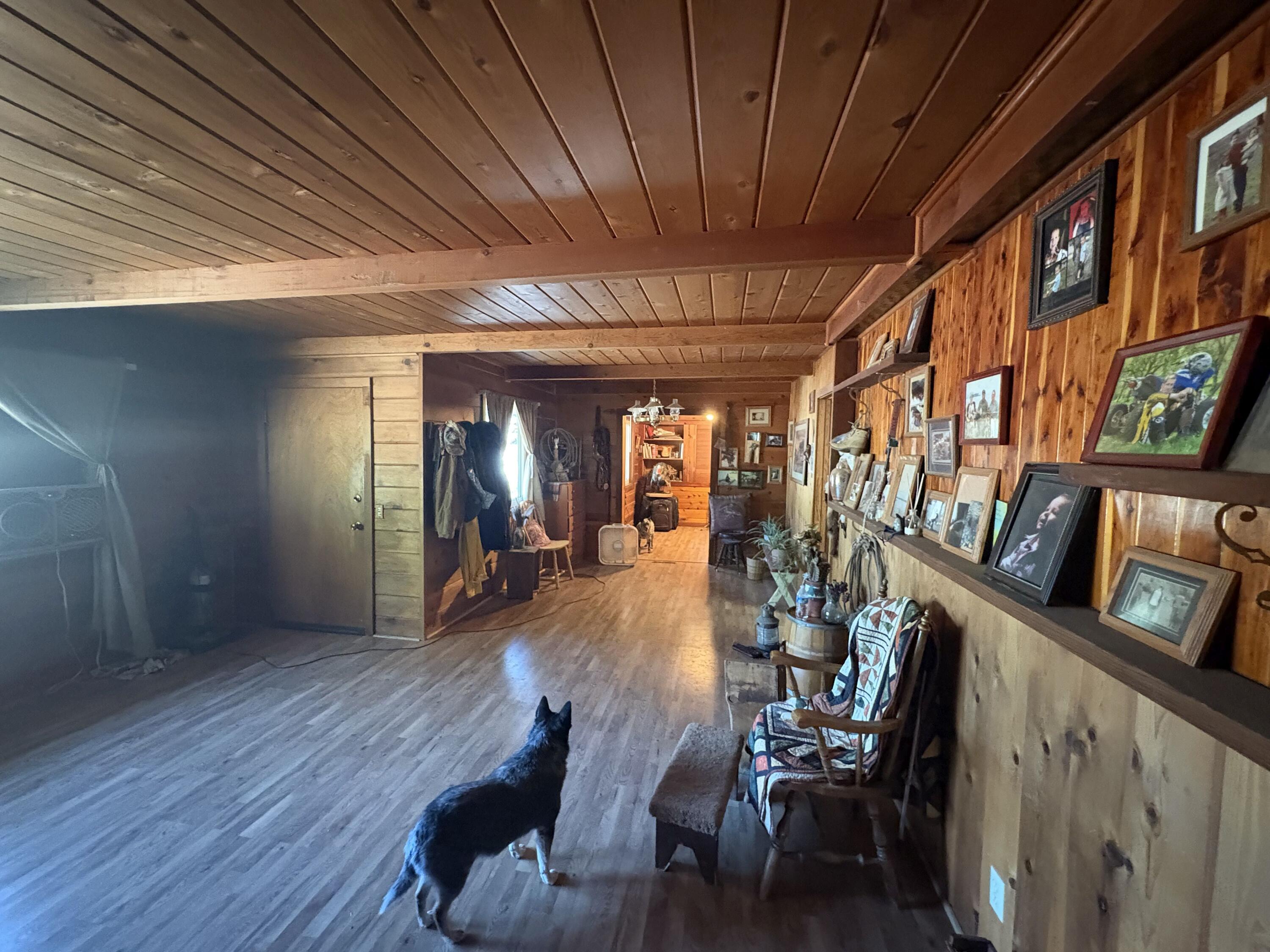41195 Brown Road Fall River Mills, CA 96028 - Photo 7 of 17 a view of a room with furniture and wooden floor
