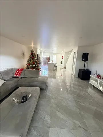 a living room with furniture and a couch