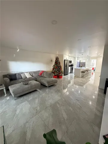 a living room with furniture and a couch