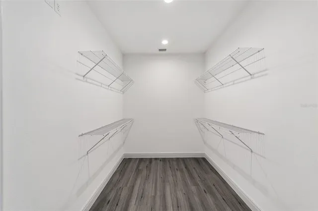 a view of an empty walk in closet
