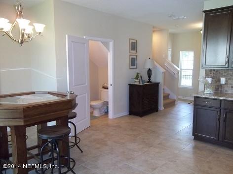 3079 Chestnut Ridge Way Orange Park, FL 32065 - Photo 14 of 54 Dining, Powder Bath, Foyer, Kitchen View