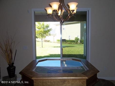 3079 Chestnut Ridge Way Orange Park, FL 32065 - Photo 35 of 54 Lanai View to Backyard from Dining - Pic