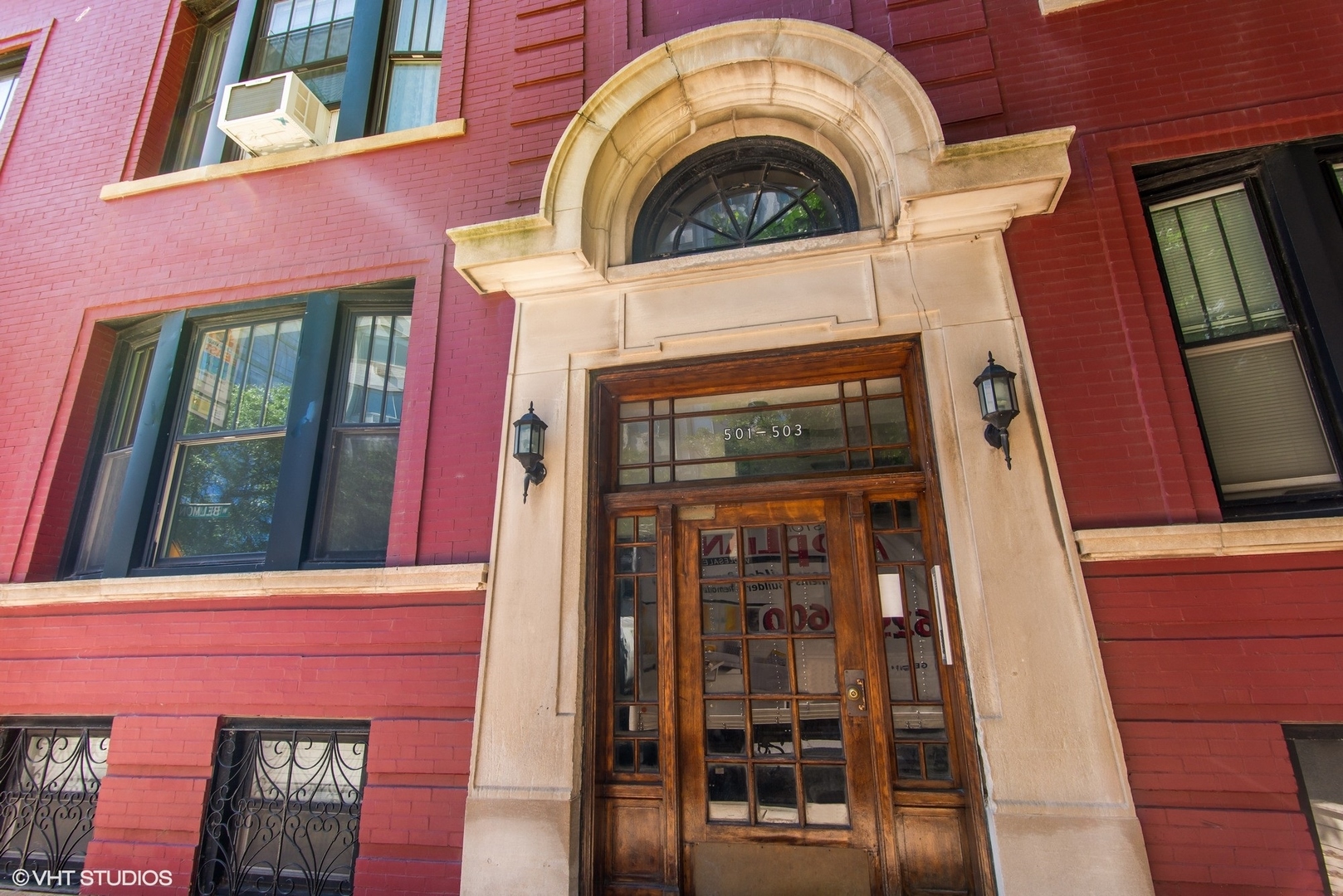 501 West Belmont Avenue, Unit 1 Chicago, IL 60657 - Photo 11 of 17 a view of building with a door and a door