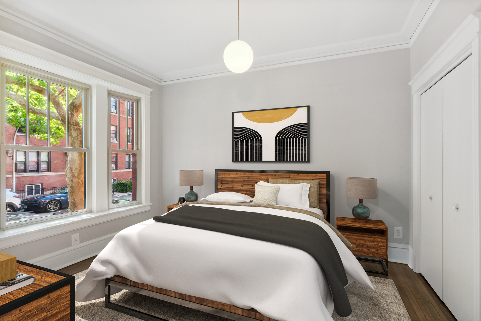 501 West Belmont Avenue, Unit 1 Chicago, IL 60657 - Photo 4 of 17 a bedroom with a bed and a large window