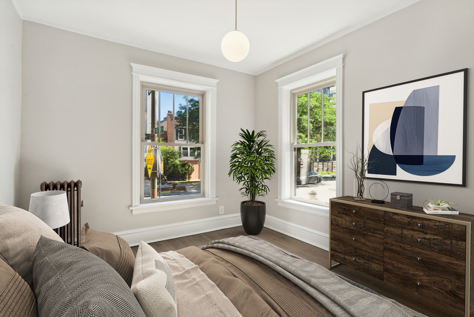 501 West Belmont Avenue, Unit 1 Chicago, IL 60657 - Photo 5 of 17 a bedroom with a large bed and a window