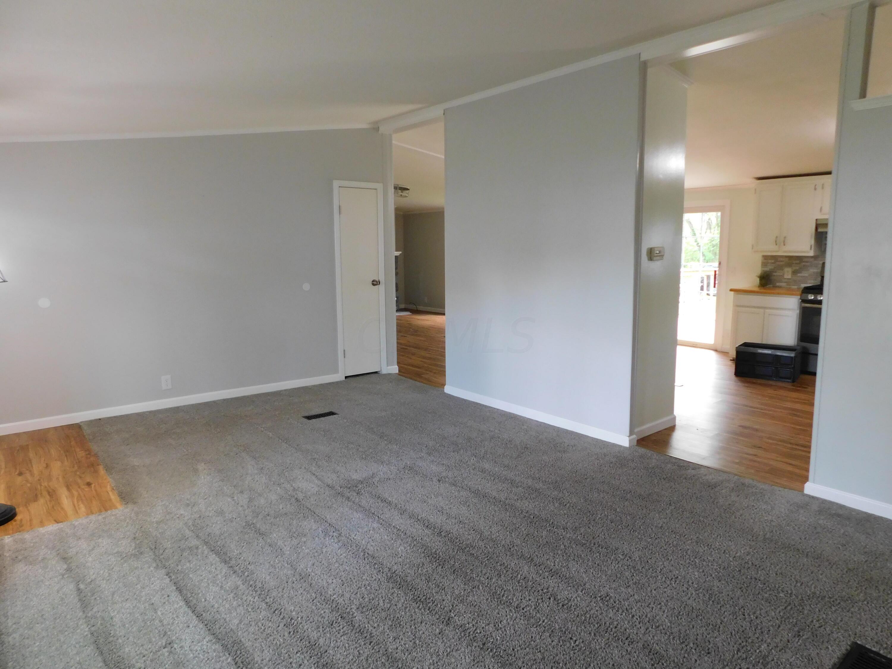 4711 Walnut Road, Unit LOT H8 Buckeye Lake, OH 43008 - Photo 6 of 42 Another view of Living Room leading into the Kitchen and Great Room