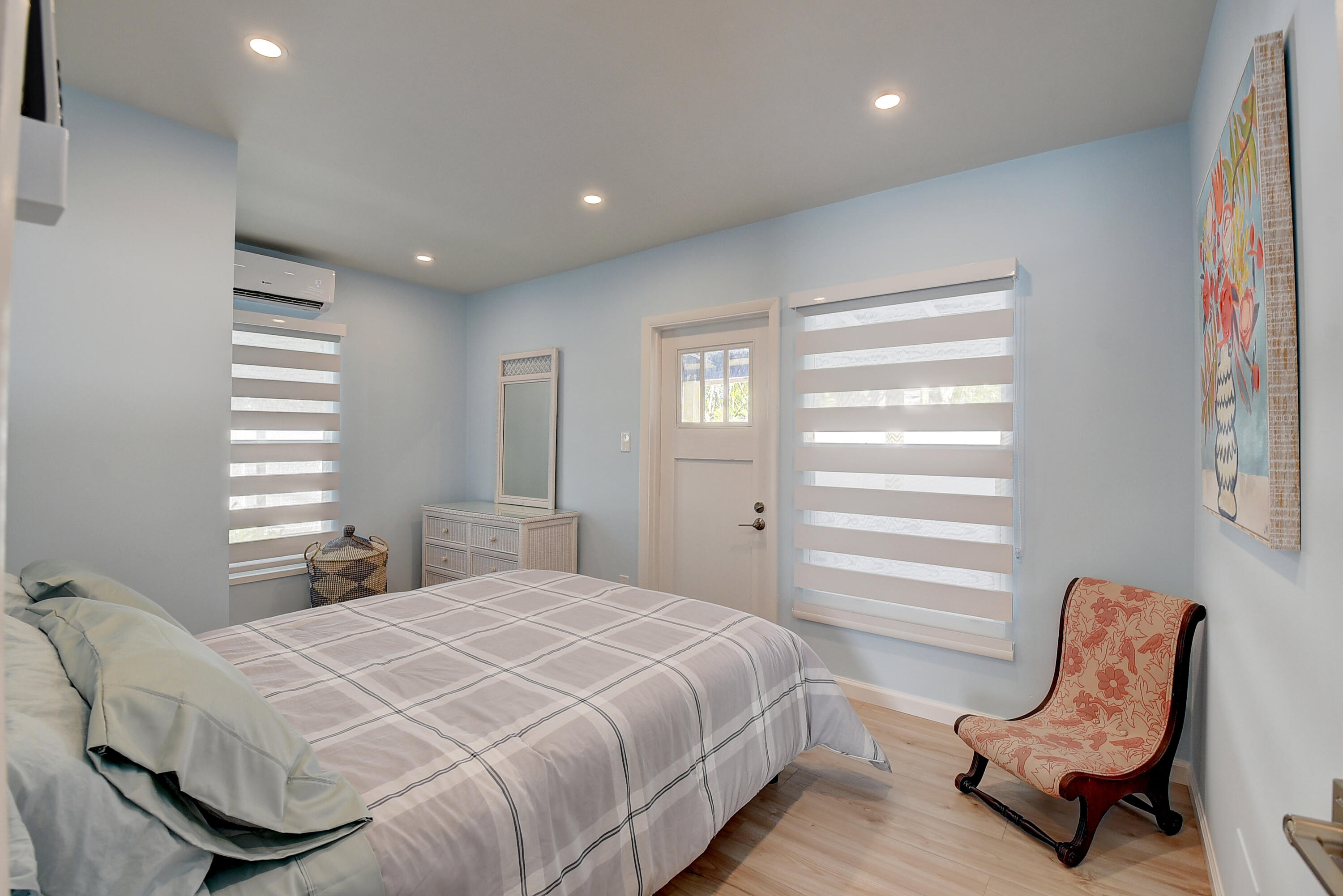 212 Southwest 1st Avenue Delray Beach, FL 33444 - Photo 14 of 15 a bedroom with a bed and a chair