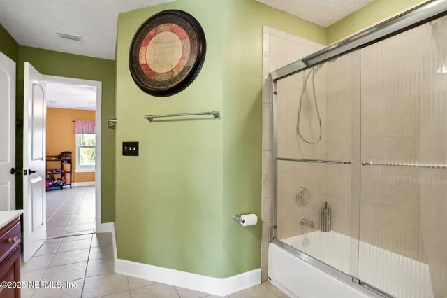 a view of a house with a swimming pool and a yard