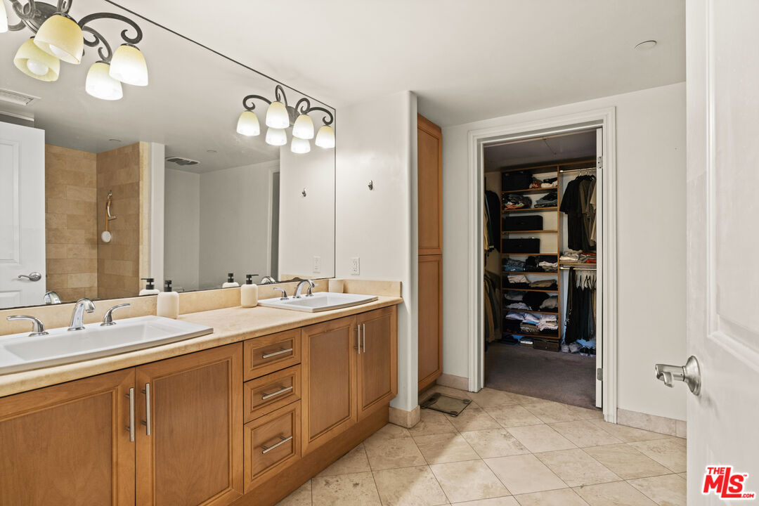 8238 West Manchester Avenue, Unit 204 Playa del Rey, CA 90293 - Photo 13 of 23 a bathroom with a sink and a mirror