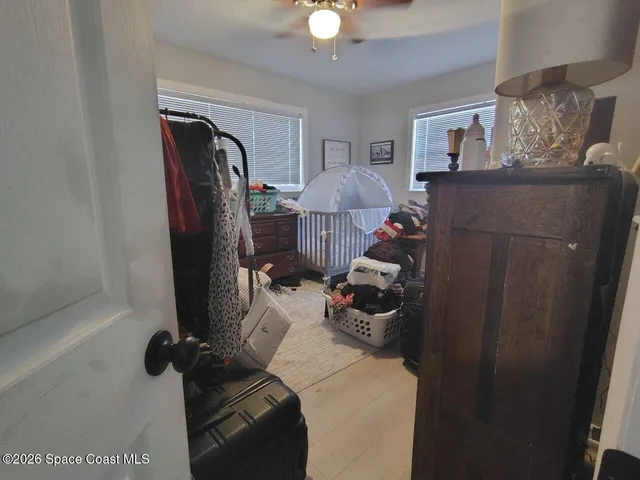 a bedroom with a bed and furniture