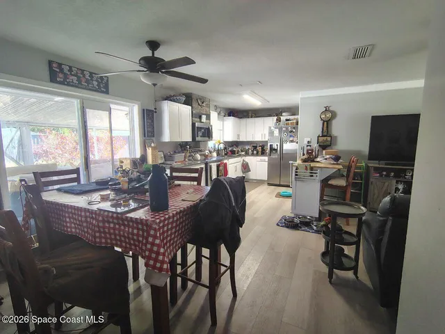 a view of a dining room with furniture