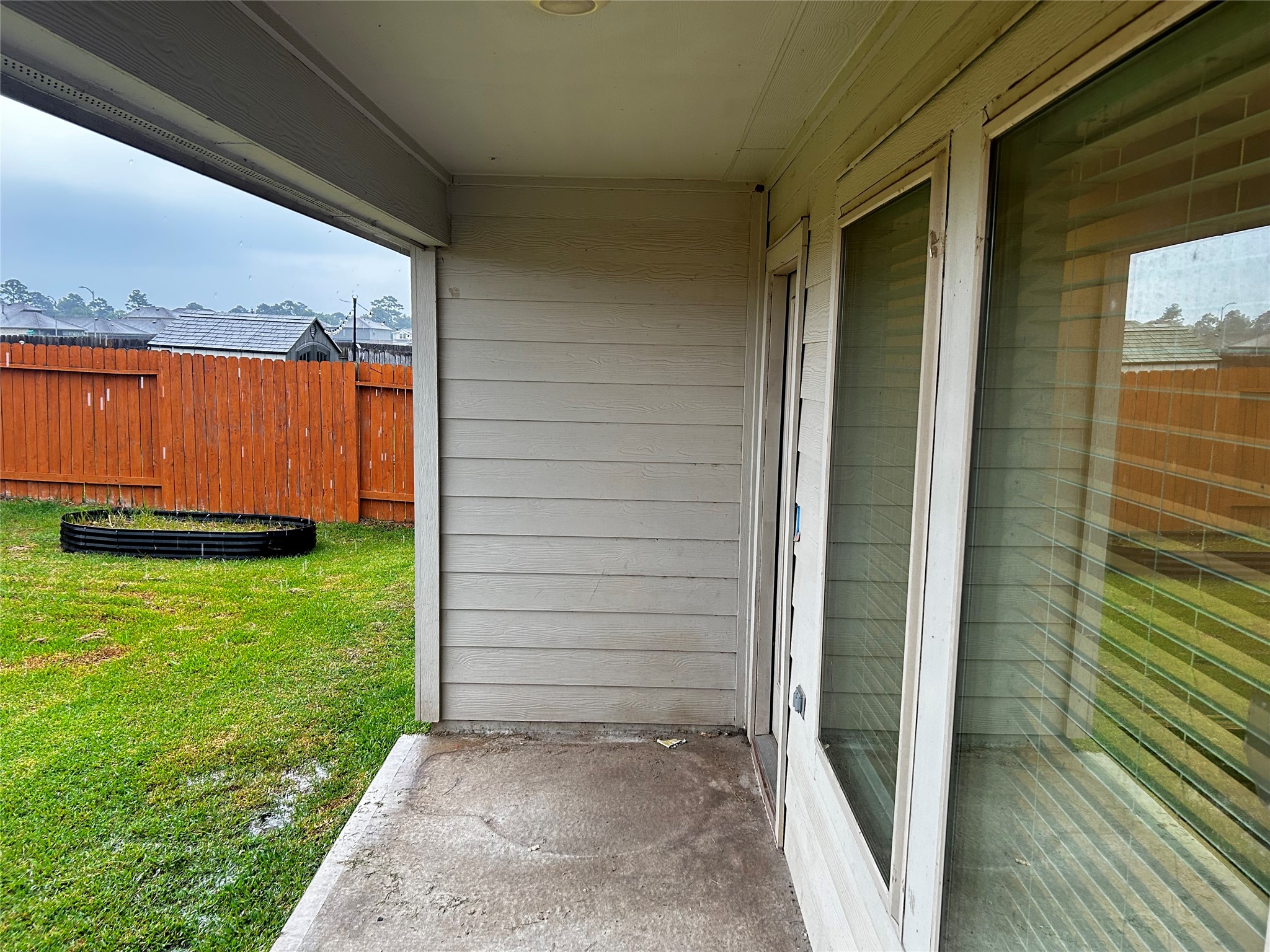 22414 Goose Pasture Lane Spring, TX 77373 - Photo 10 of 11 Enjoy this oversize covered patio to keep you cool on those hot summer days>