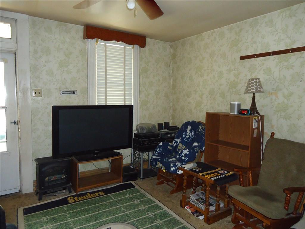 515 Jefferson Street Rochester, PA 15074 - Photo 4 of 24 Living room with ceiling fan.