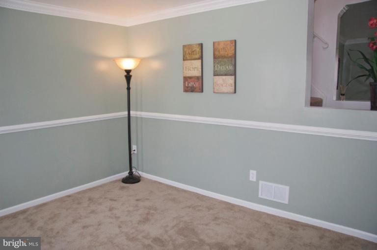 1949 Quentin Road Dundalk, MD 21222 - Photo 11 of 21 a view of a room with a fan