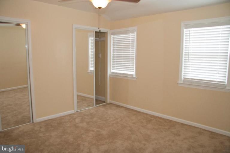 1949 Quentin Road Dundalk, MD 21222 - Photo 14 of 21 an empty room with windows