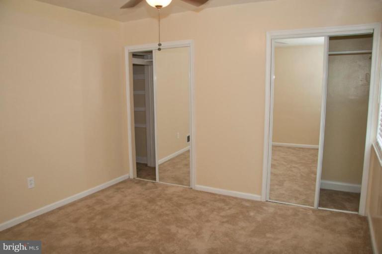 1949 Quentin Road Dundalk, MD 21222 - Photo 15 of 21 an empty room with closet and a hallway