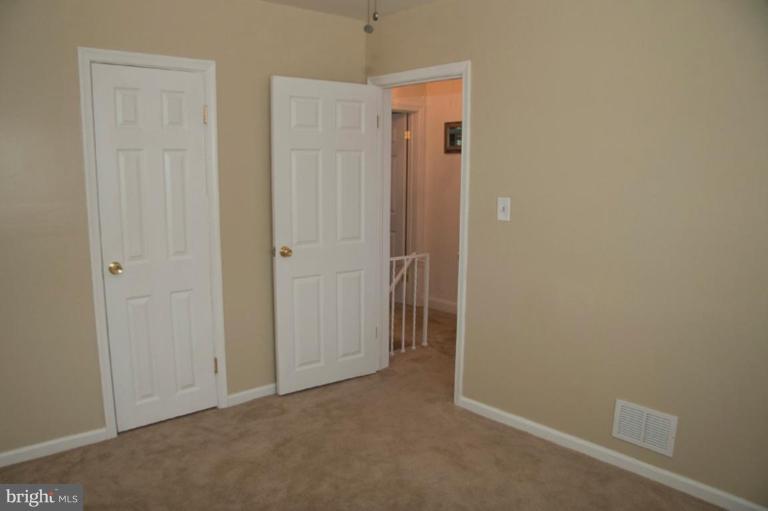 1949 Quentin Road Dundalk, MD 21222 - Photo 17 of 21 an empty room with closet area