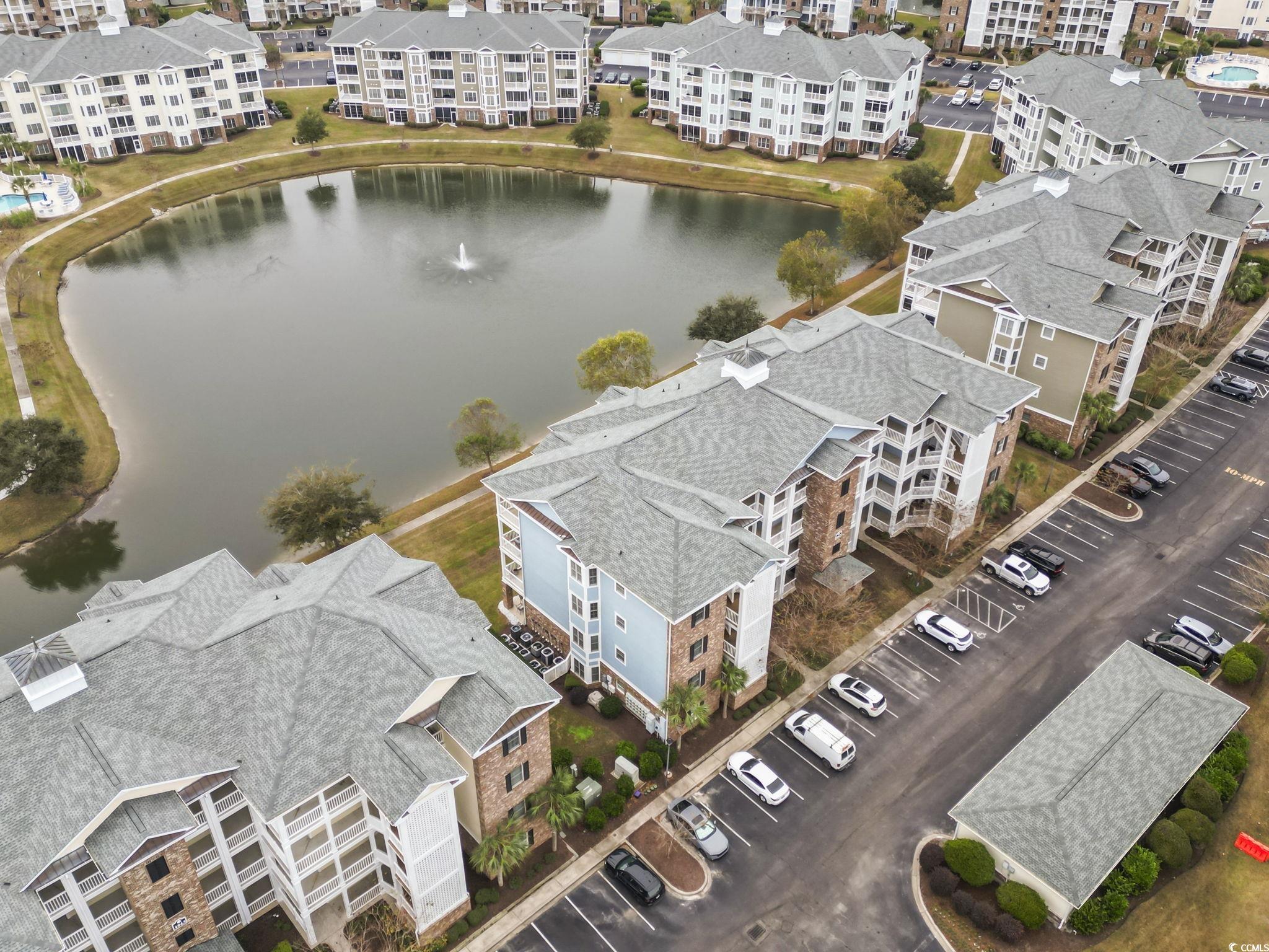 4847 Luster Leaf Circle, Unit 301 Myrtle Beach, SC 29577 - Photo 2 of 16 Aerial view of a large body of water and apartment complex / building