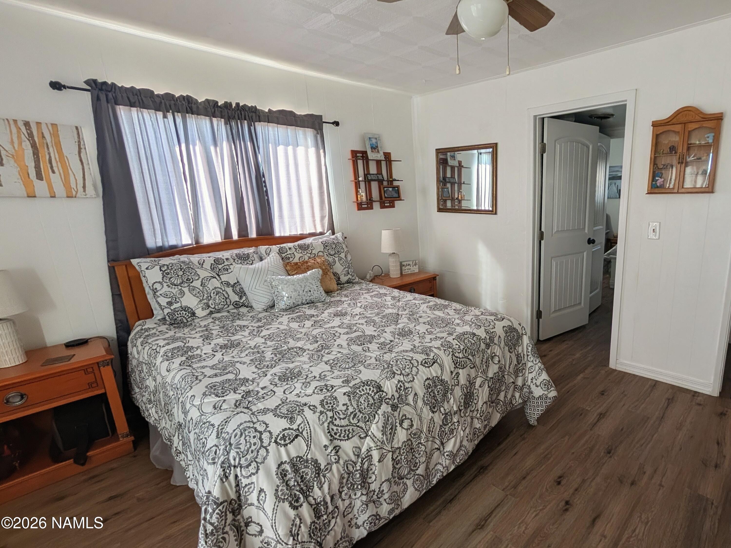 15702 Bonanza Loop Ehrenberg, AZ 85334 - Photo 5 of 13 a bedroom with a bed and a window