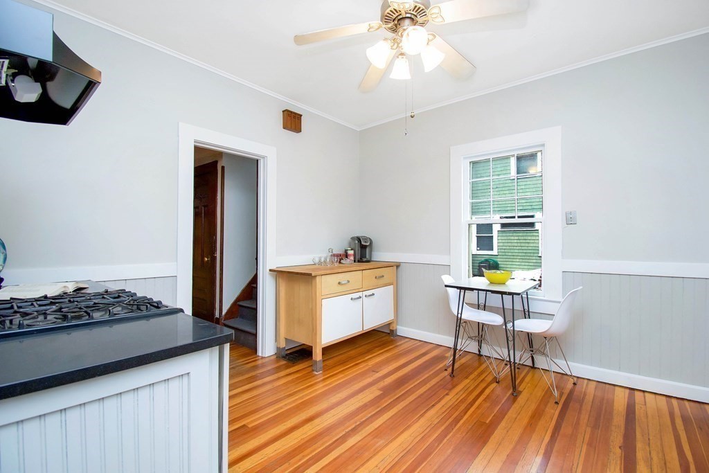 59 Fairfield Street Springfield, MA 01108 - Photo 13 of 42 a room with wooden floor and furniture