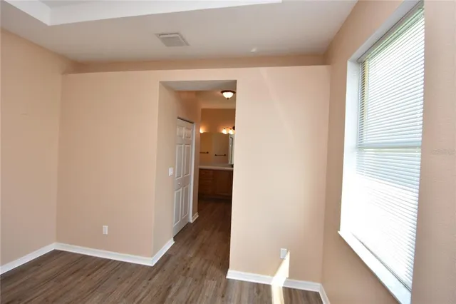 a view of entryway with wooden floor