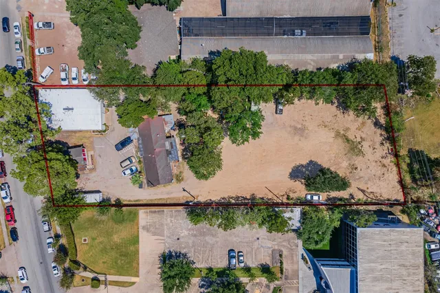 an aerial view of house with yard swimming pool and outdoor seating