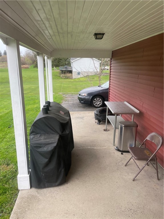 95 Brooks Road Henrietta, NY 14586 - Photo 16 of 18 Covered Back Porch