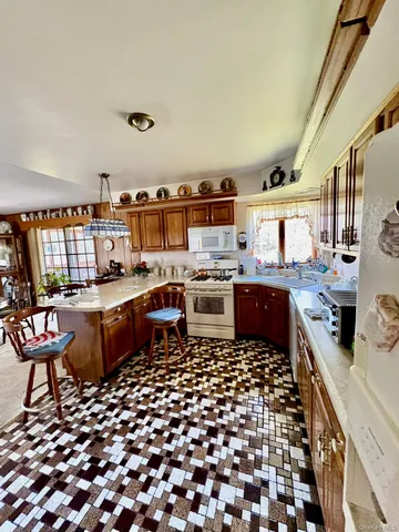 a large kitchen with lots of appliances