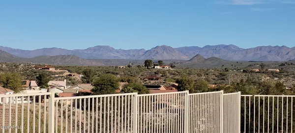 a view of a houses with a mountain view