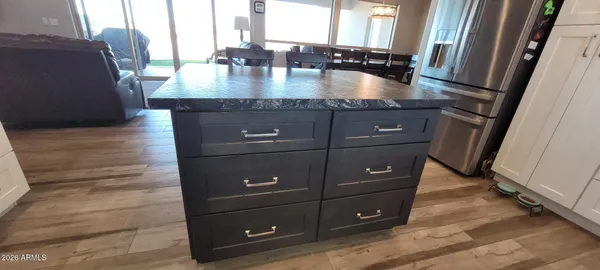 a room with a table and chairs