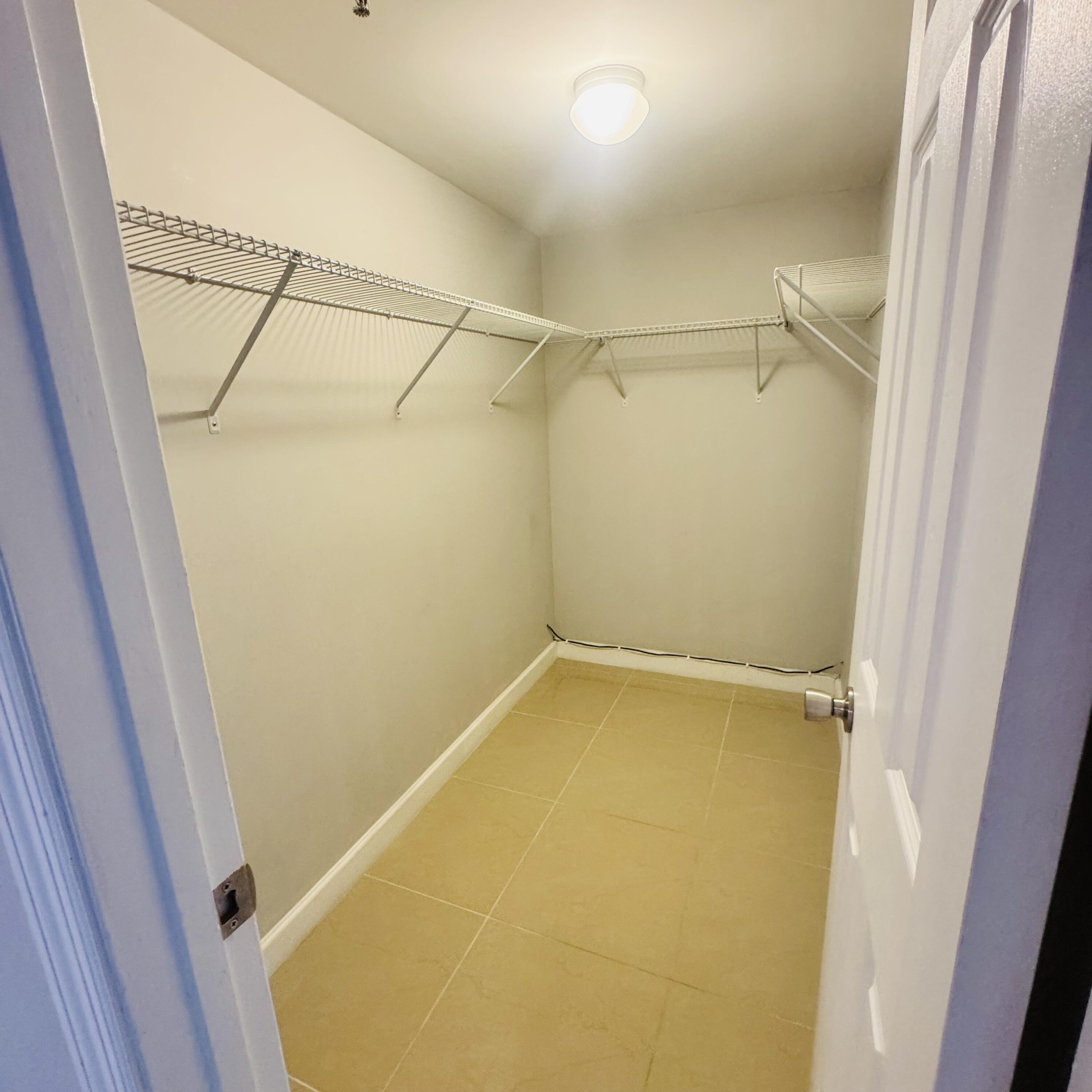 9235 Southwest 8th Street, Unit 503 Boca Raton, FL 33428 - Photo 10 of 17 a view of a small room