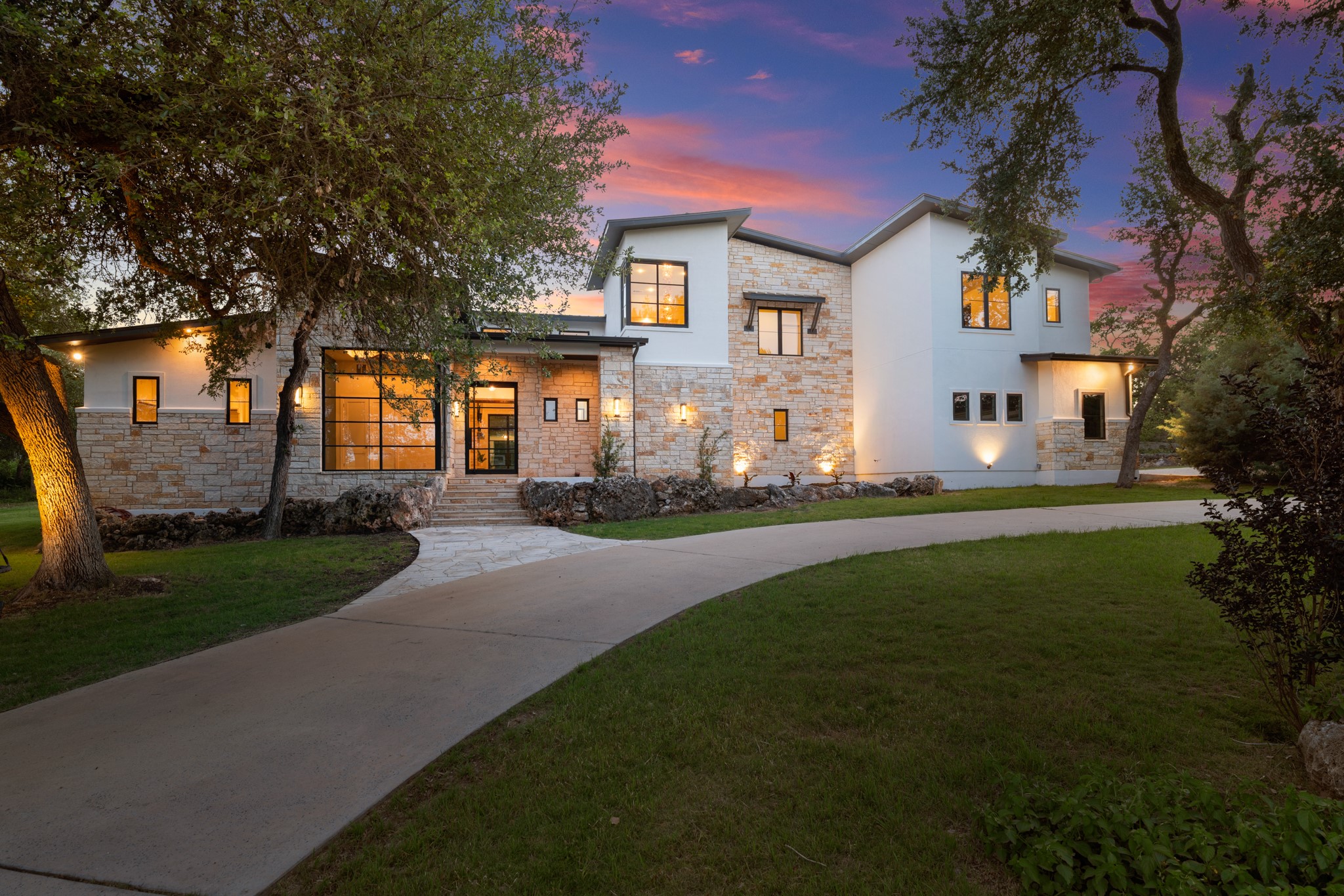 11002 Foundation Road Austin, TX 78726 - Photo 1 of 40 a front view of a house with garden