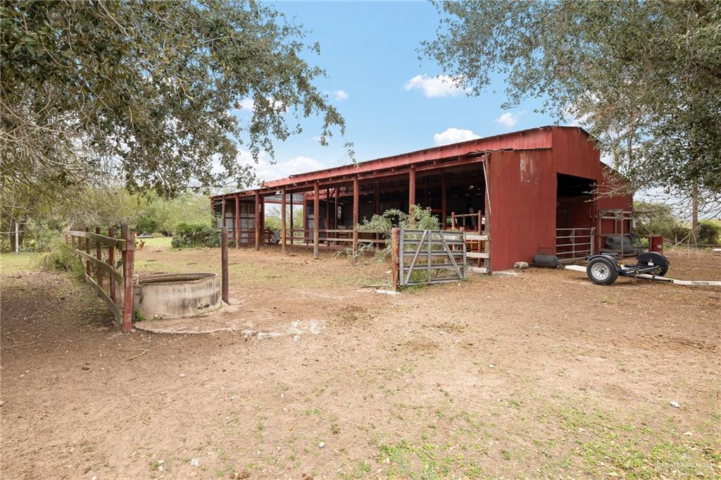 23725 North Val Verde Road Edinburg, TX 78542 - Photo 34 of 36 a backyard of a house with yard and tree