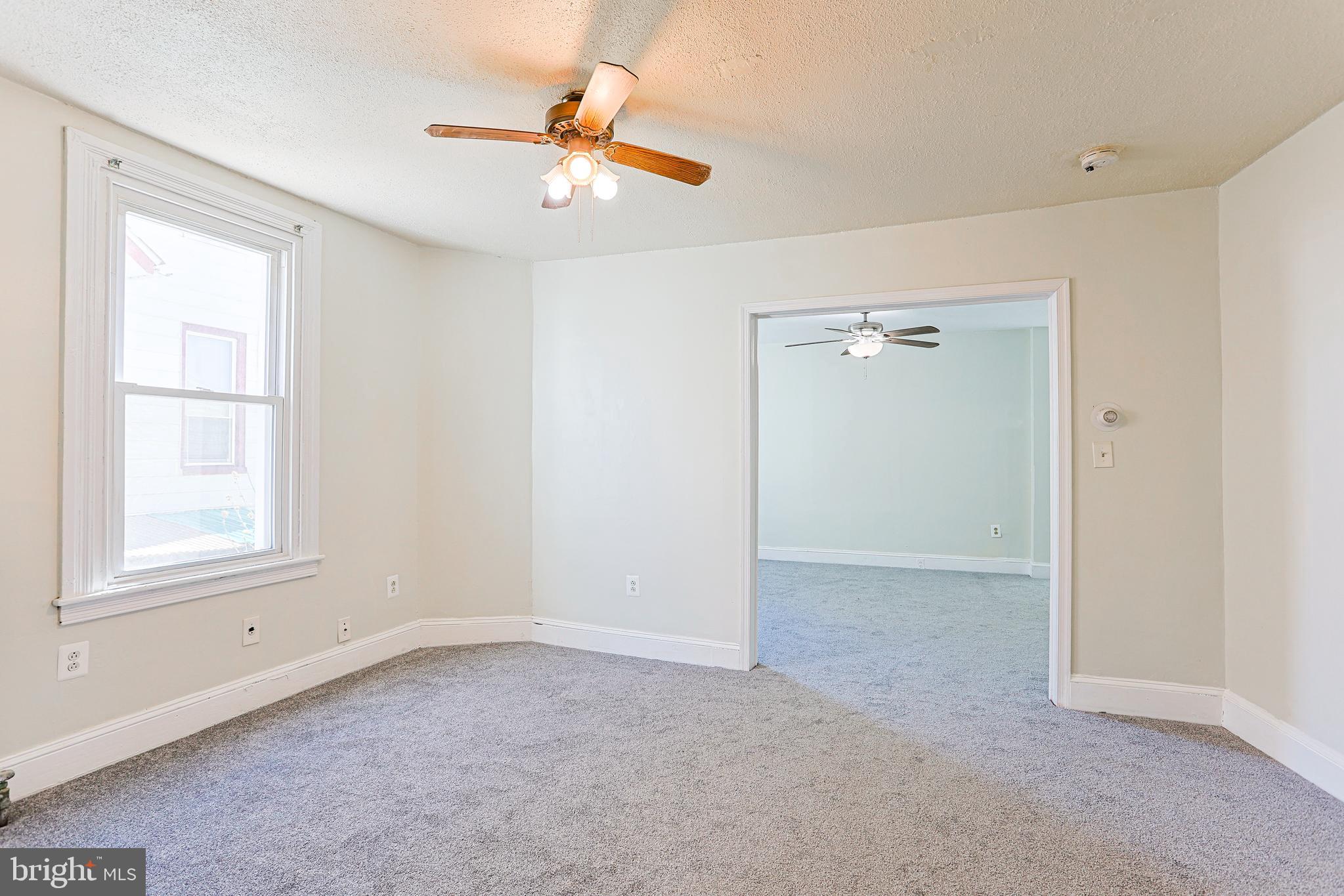 349 South Springfield Road Clifton Heights, PA 19018 - Photo 11 of 40 an empty room with a window and a ceiling fan