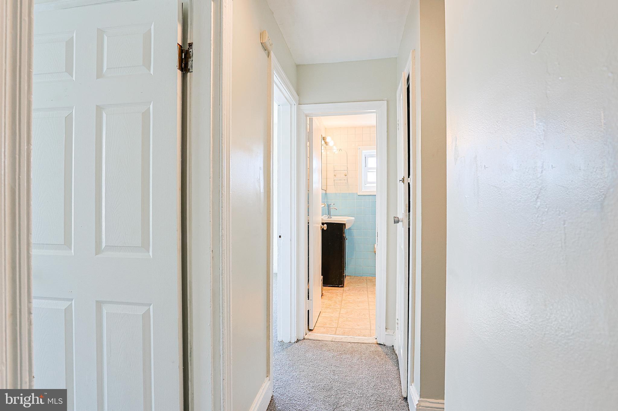 349 South Springfield Road Clifton Heights, PA 19018 - Photo 16 of 40 a view of a bathroom from a hallway