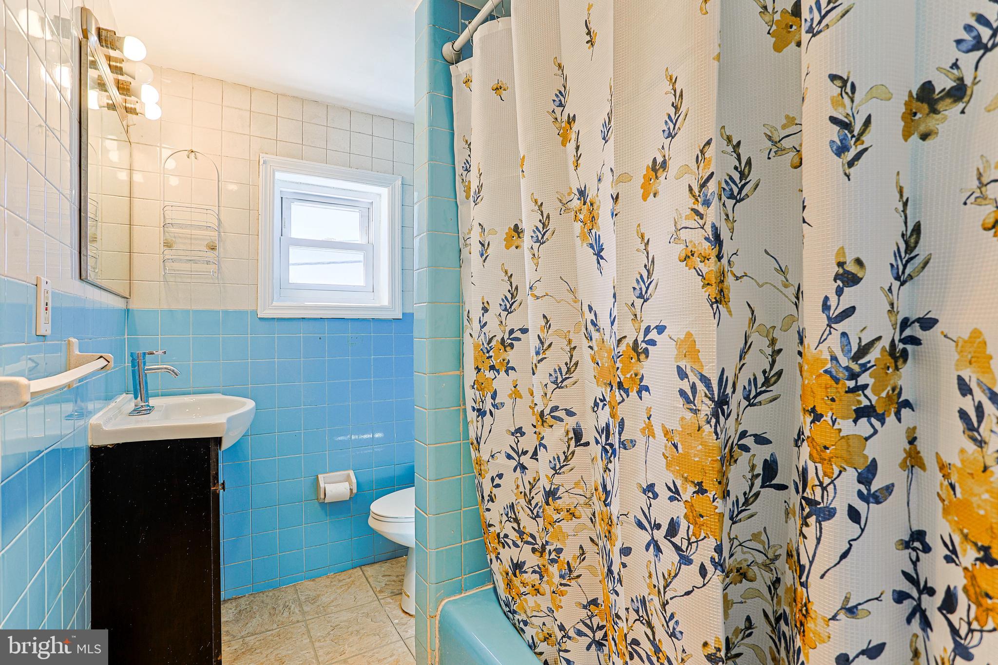349 South Springfield Road Clifton Heights, PA 19018 - Photo 17 of 40 a bathroom with a sink and a mirror