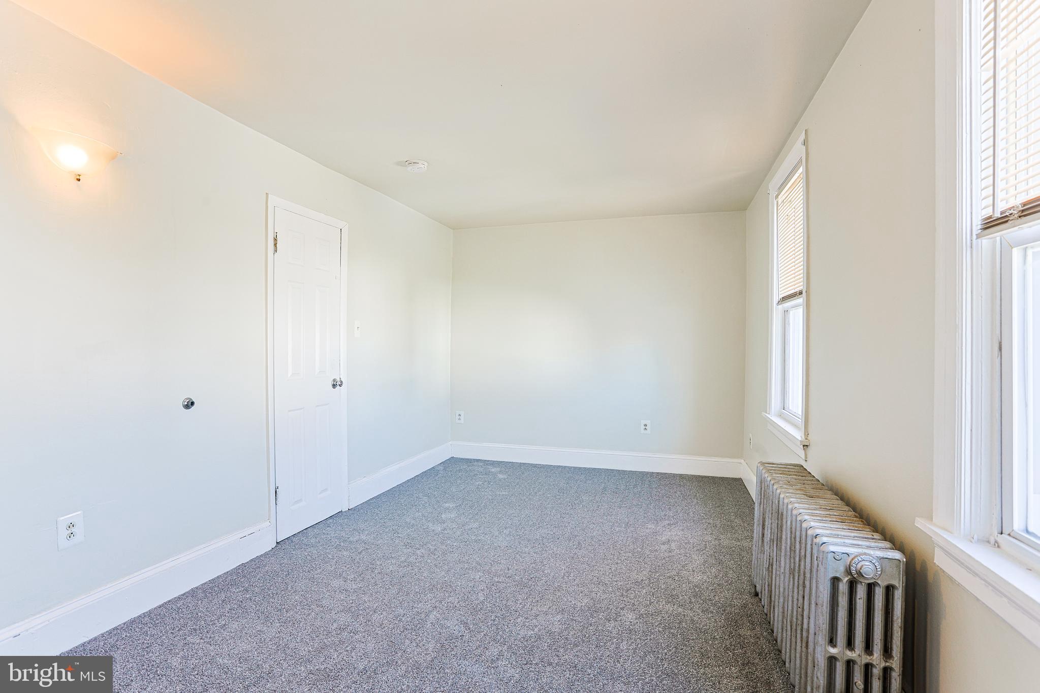 349 South Springfield Road Clifton Heights, PA 19018 - Photo 19 of 40 a view of an empty room with a window