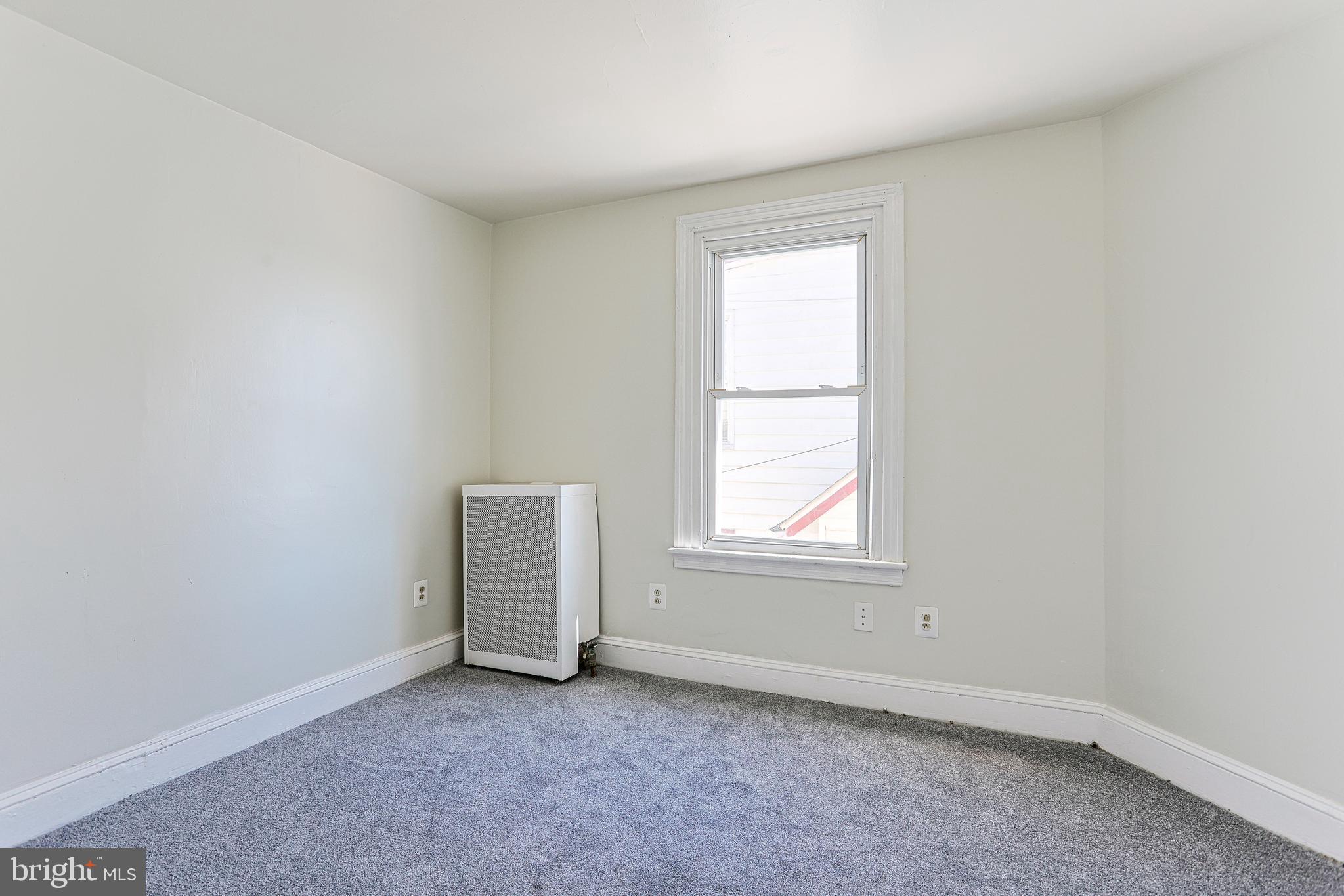 349 South Springfield Road Clifton Heights, PA 19018 - Photo 21 of 40 an empty room with a window