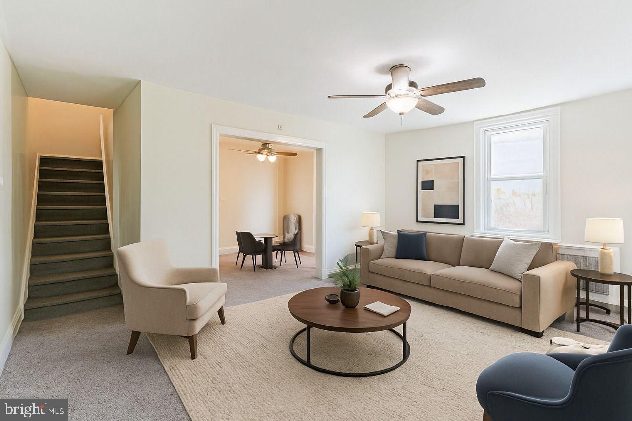 349 South Springfield Road Clifton Heights, PA 19018 - Photo 6 of 40 a living room with furniture and a large window