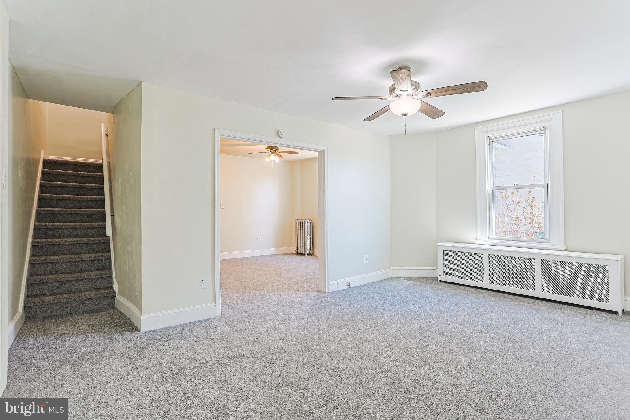 349 South Springfield Road Clifton Heights, PA 19018 - Photo 7 of 40 an empty room with windows and fan