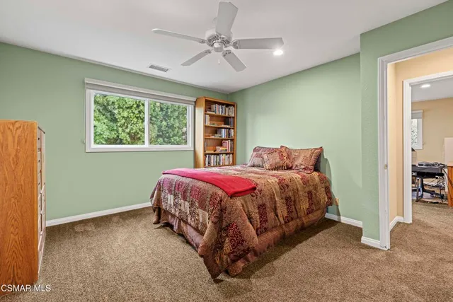 a patio with a table and chairs