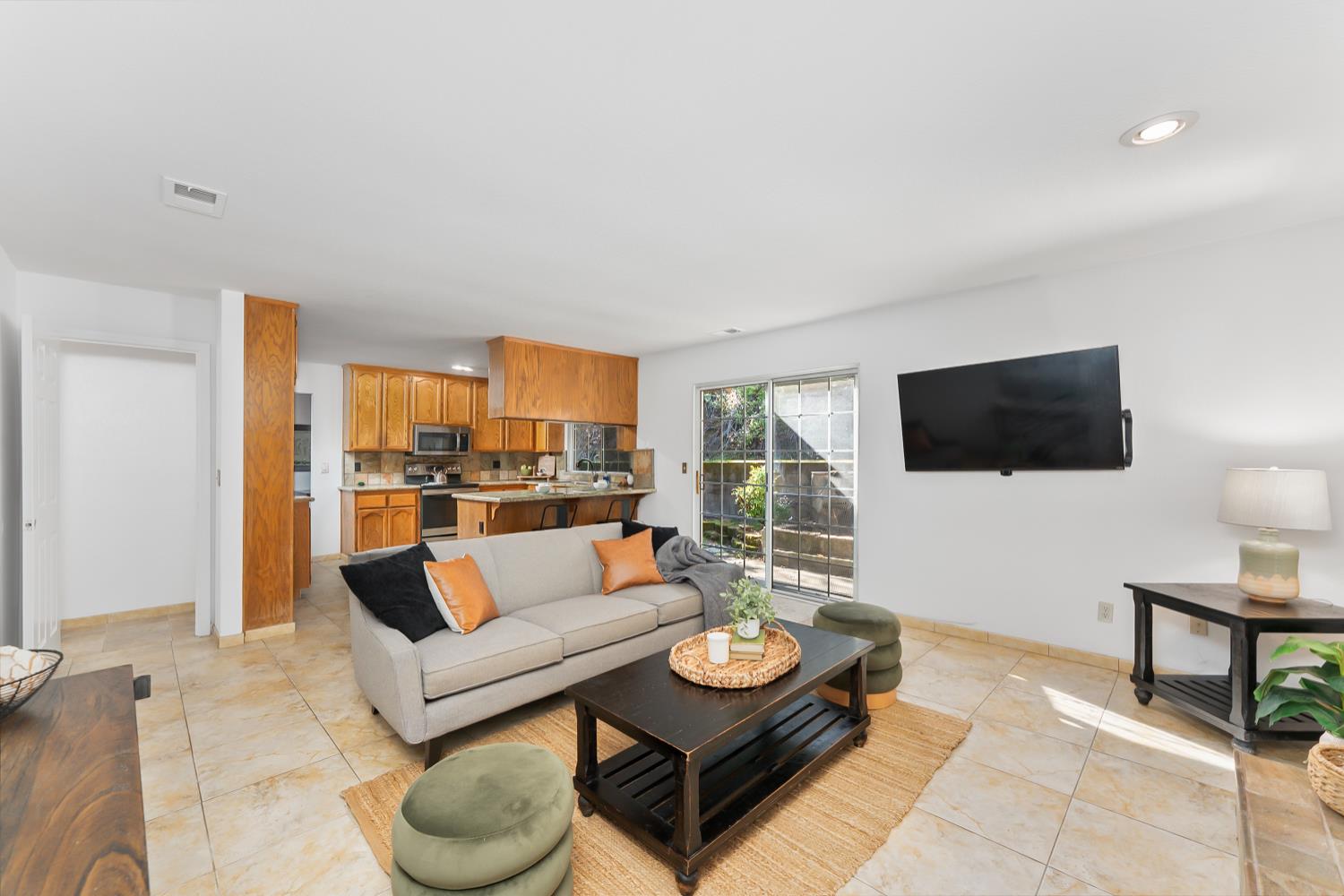 2960 Pasada Road Cameron Park, CA 95682 - Photo 18 of 40 a living room with furniture and a flat screen tv