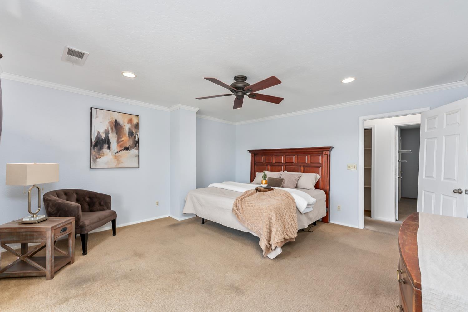 2960 Pasada Road Cameron Park, CA 95682 - Photo 20 of 40 a bedroom with bed and a chandelier