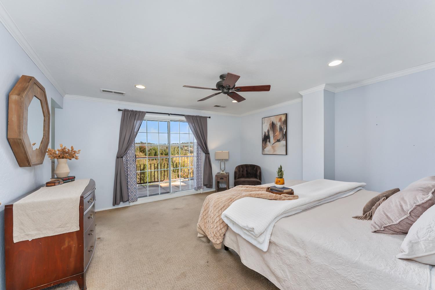 2960 Pasada Road Cameron Park, CA 95682 - Photo 21 of 40 a bedroom with a bed and a chair