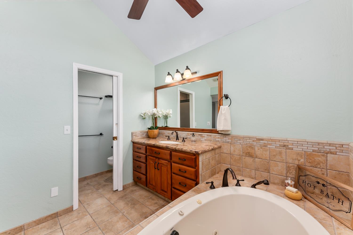 2960 Pasada Road Cameron Park, CA 95682 - Photo 23 of 40 a bathroom with a sink and a mirror
