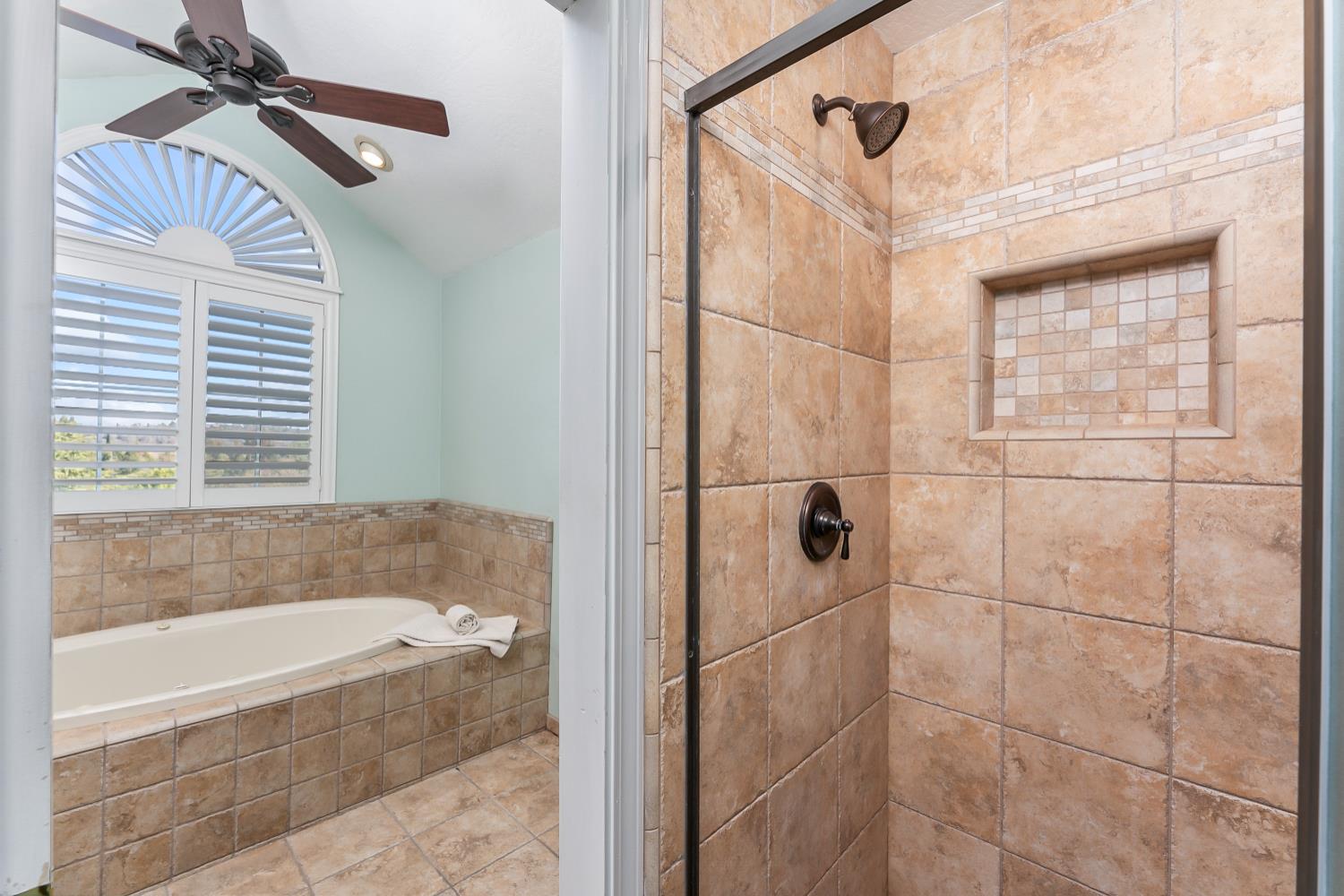 2960 Pasada Road Cameron Park, CA 95682 - Photo 26 of 40 a bathroom with a bathtub and shower