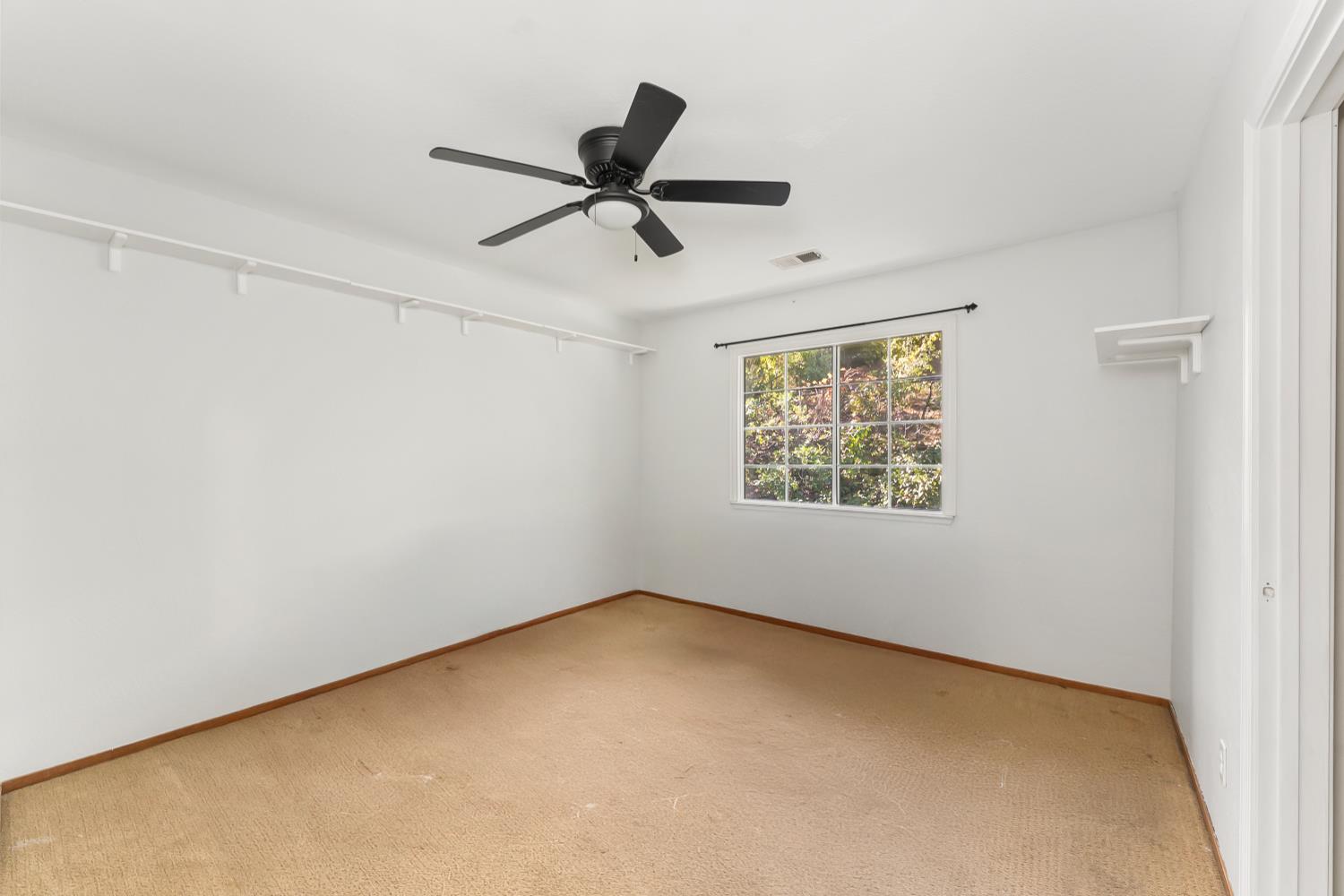 2960 Pasada Road Cameron Park, CA 95682 - Photo 28 of 40 an empty room with a window