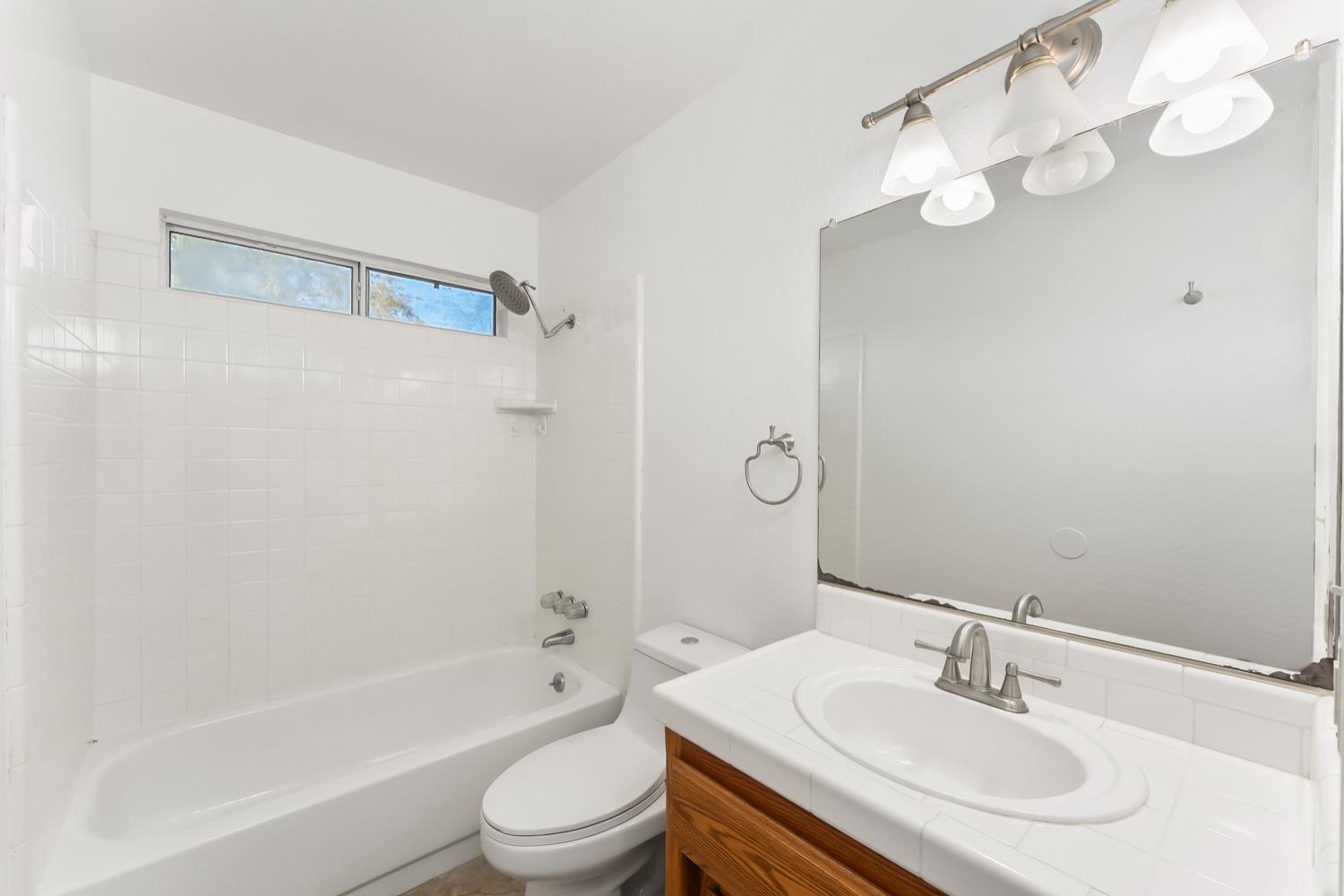 2960 Pasada Road Cameron Park, CA 95682 - Photo 30 of 40 a bathroom with a sink a toilet and shower